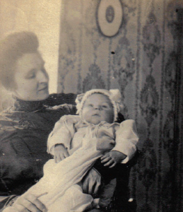 Grandma, holding my father